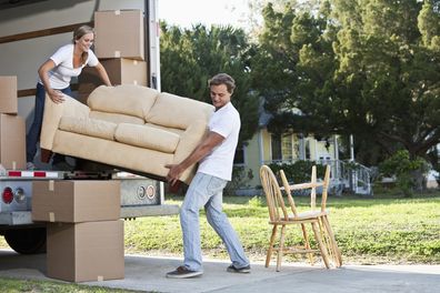 Moving truck, couple moving house