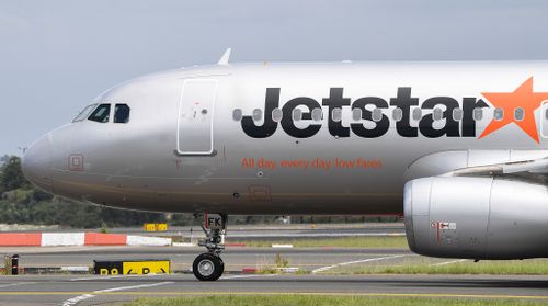 Jetstar plane on tarmac.