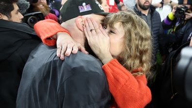Taylor Swift and Travis Kelce after the Chiefs win at the AFC Championship Game.