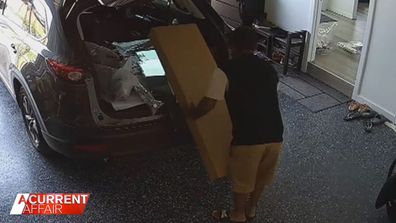 Bhavesh Patel seen getting furniture from his car. 