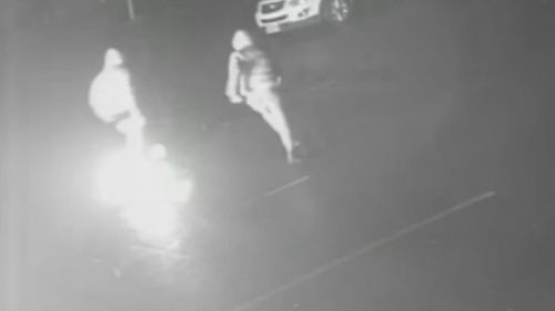 Security cameras have captured the moment a South Australian barber shop was caught up in a fire bomb attack.