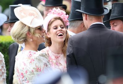 Zara Tindall and Princess Beatrice of York laugh as they attend day two of Royal Ascot 2024 at Ascot Racecourse on June 19, 2024 in Ascot, England. 