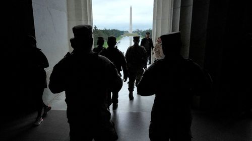 Members of the National Guard patrol the Lincoln Memorial in Washington, DC, on August 18.