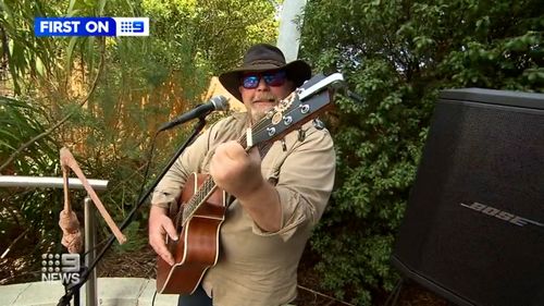 A 56-year-old busker has been bashed outside a supermarket in Melbourne's north-east in an unprovoked attack.