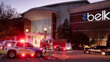 Emergency vehicles congregate around the entrance to Belk at Southpoint Mall in Durham, North Carolina.