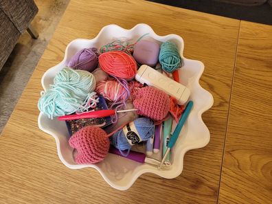 Junk bowl with crochet supplies