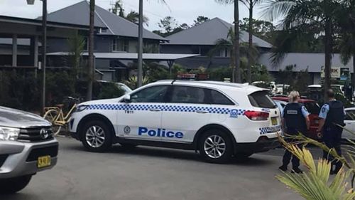 Police raided the motel near Byron Bay in the hunt for the two men.