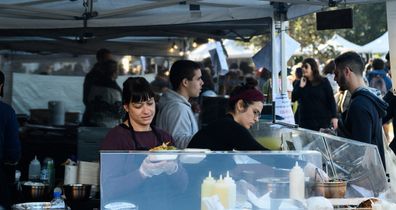 People looking at stalls at the Bondi Farmers Market, Bondi Beach, Sydney, Saturday, June 6, 2020. 