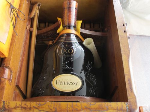 Six litres of Hennessy Cognac, valued at $25,000, were among the items seized by police.