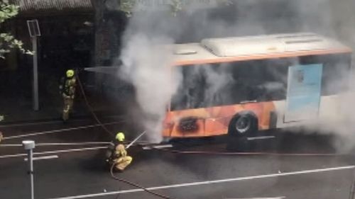 Smoke was shown billowing from the bus.