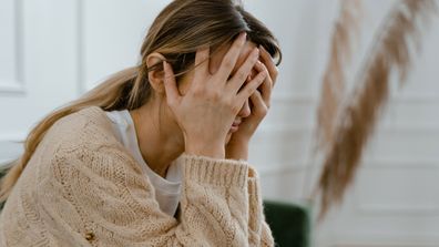 Stock photo of abused woman domestic violence victim.