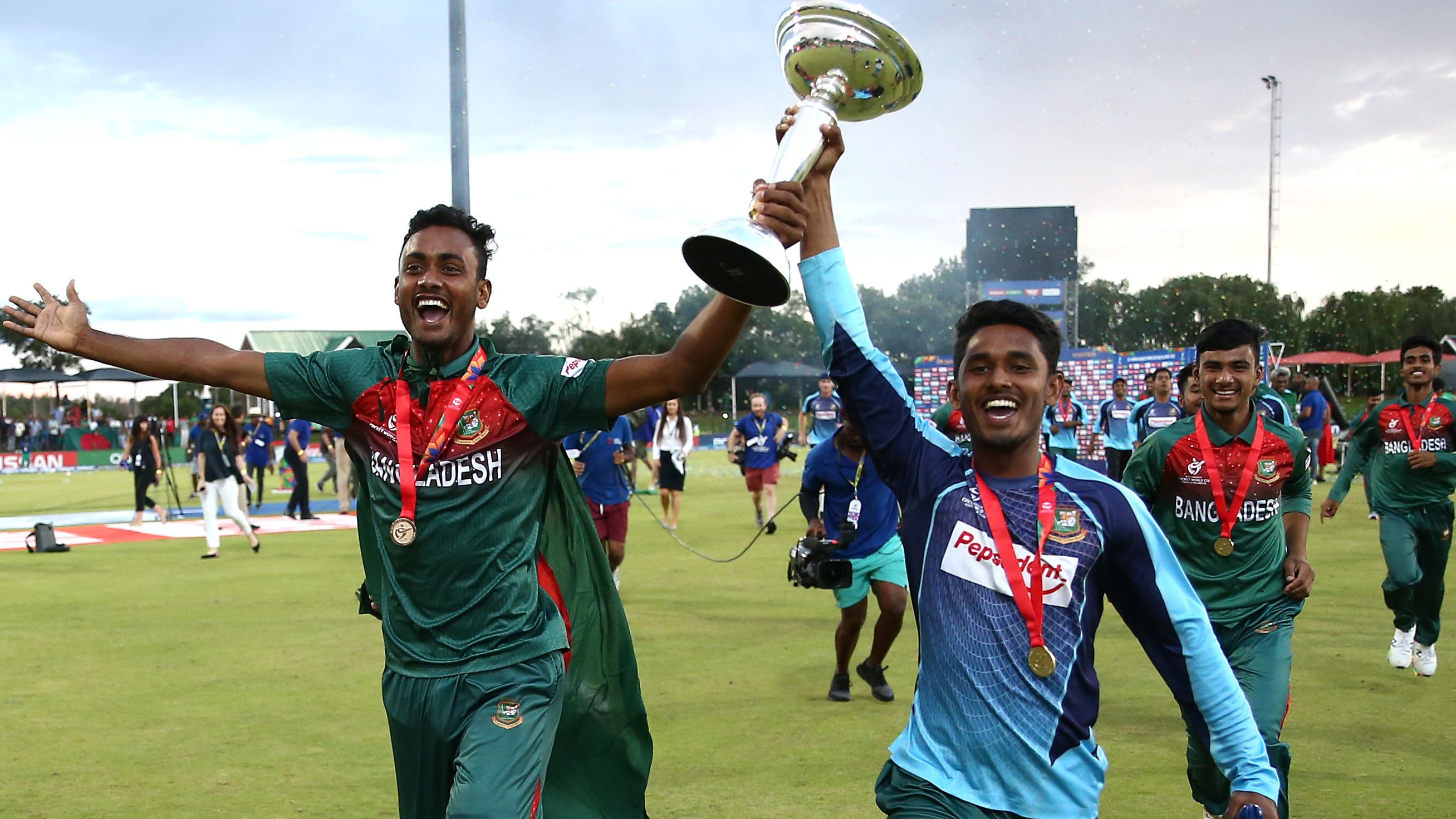 Bangladesh players celebrate with the U19s World Cup trophy.