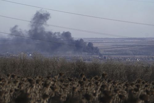 Smoke billows during fighting between Ukrainian and Russian forces in Soledar, Donetsk region, Ukraine, Wednesday, Jan. 11, 2023. 