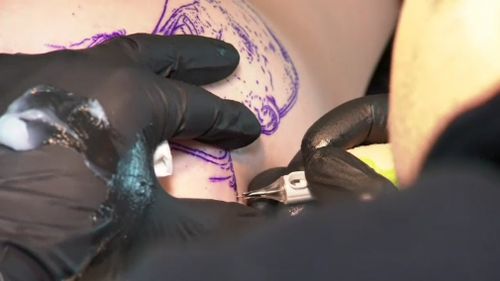 The tattoo is about 10cm. (9NEWS)