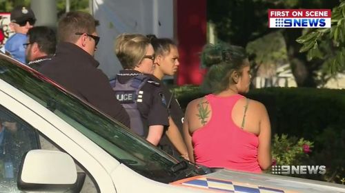 Nine people were arrested in the carpark of a fast food outlet. (9NEWS)