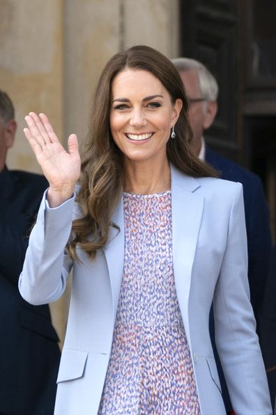 Kate, Duchess of Cambridge waves as she leaves with Britain's Prince William after visiting the Fitzwilliam Museum to view a painted portrait of themselves as it is revealed to the public for the first time, in Cambridge, England, Thursday June 23, 2022.  