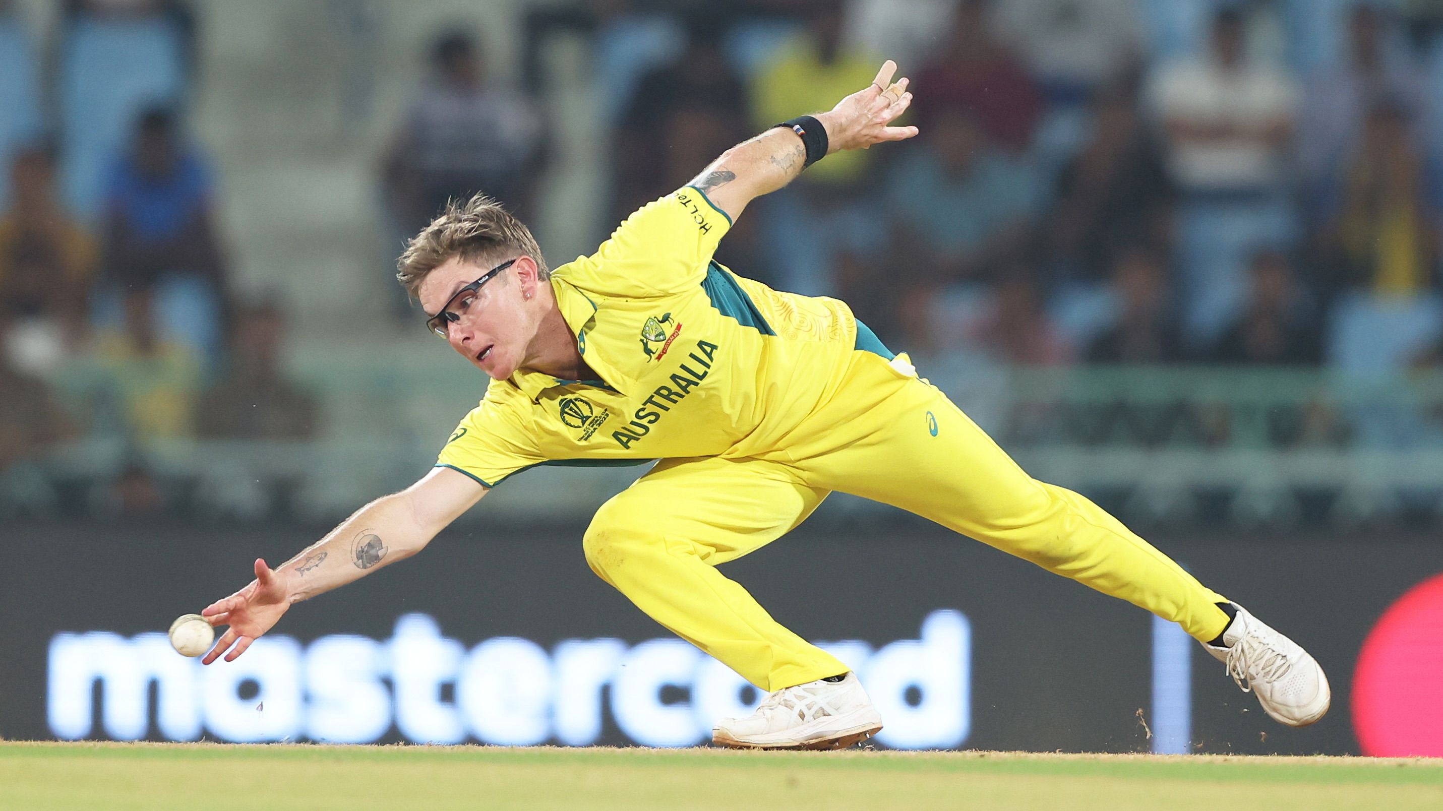 Adam Zampa of Australia fields the ball during the ICC Men&#x27;s Cricket World Cup India 2023 between Australia and Sri Lanka at BRSABVE Cricket Stadium on October 16, 2023 in Lucknow, India. (Photo by Robert Cianflone/Getty Images)