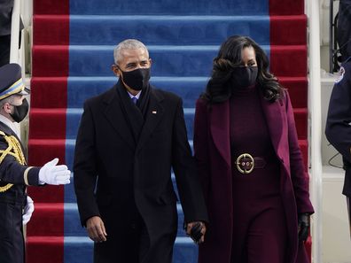 Former President Barack Obama and his wife Michelle arrive for the 59th Presidential Inauguration at the U.S. Capitol for President-elect Joe Biden in Washington, Wednesday, Jan. 20, 2021. (AP Photo/Patrick Semansky, Pool)
