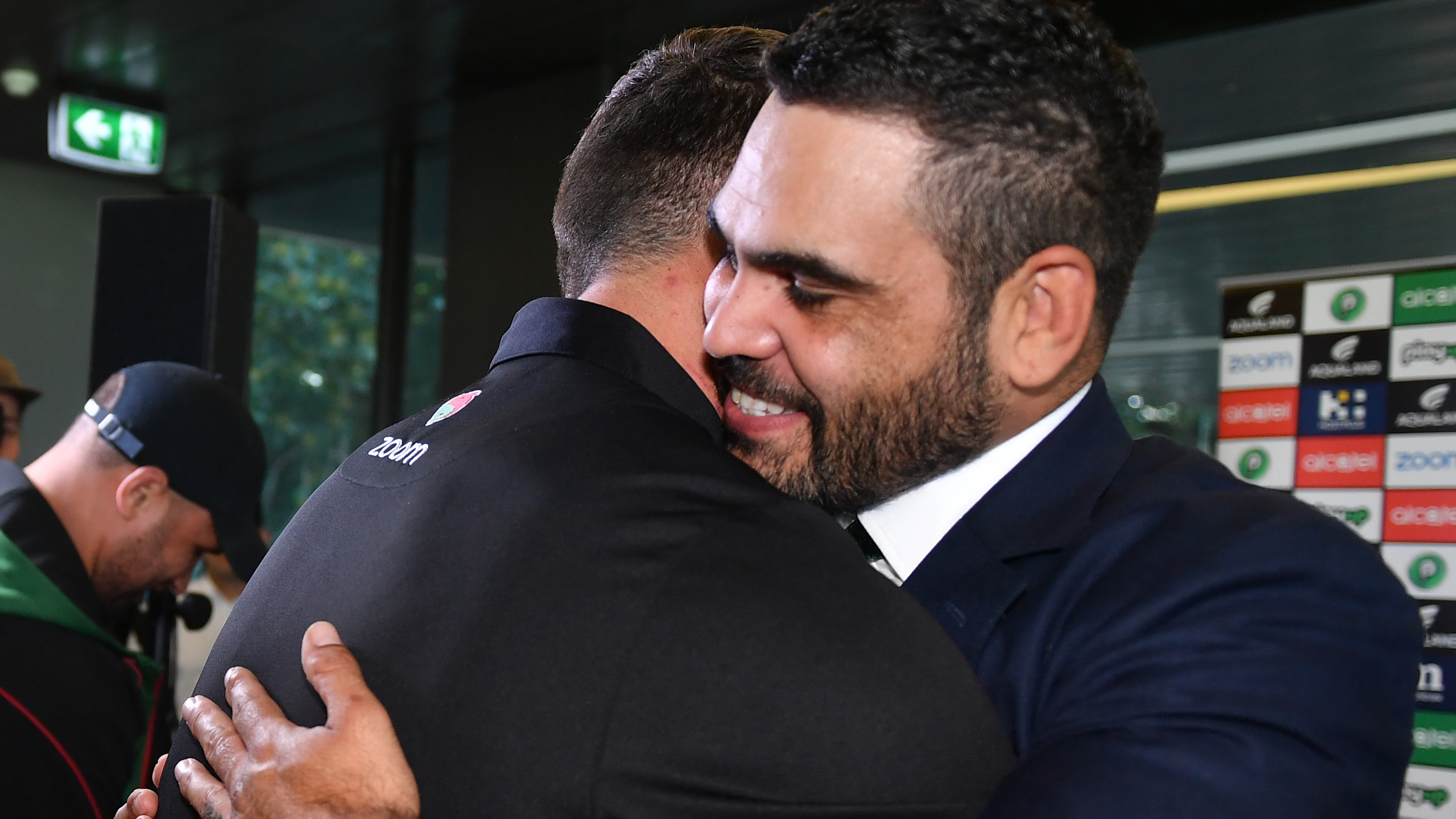 Greg Inglis is embraced at his retirement announcement.