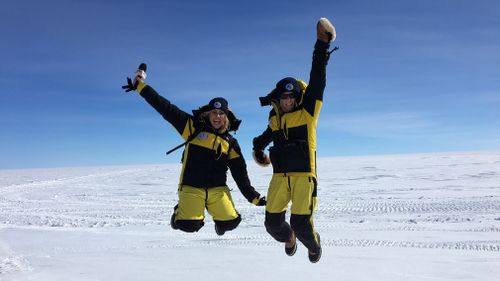 TODAY Melbourne Reporter Christine Ahern enjoys a jubilant leap at the Antarctic Circle. (9NEWS)