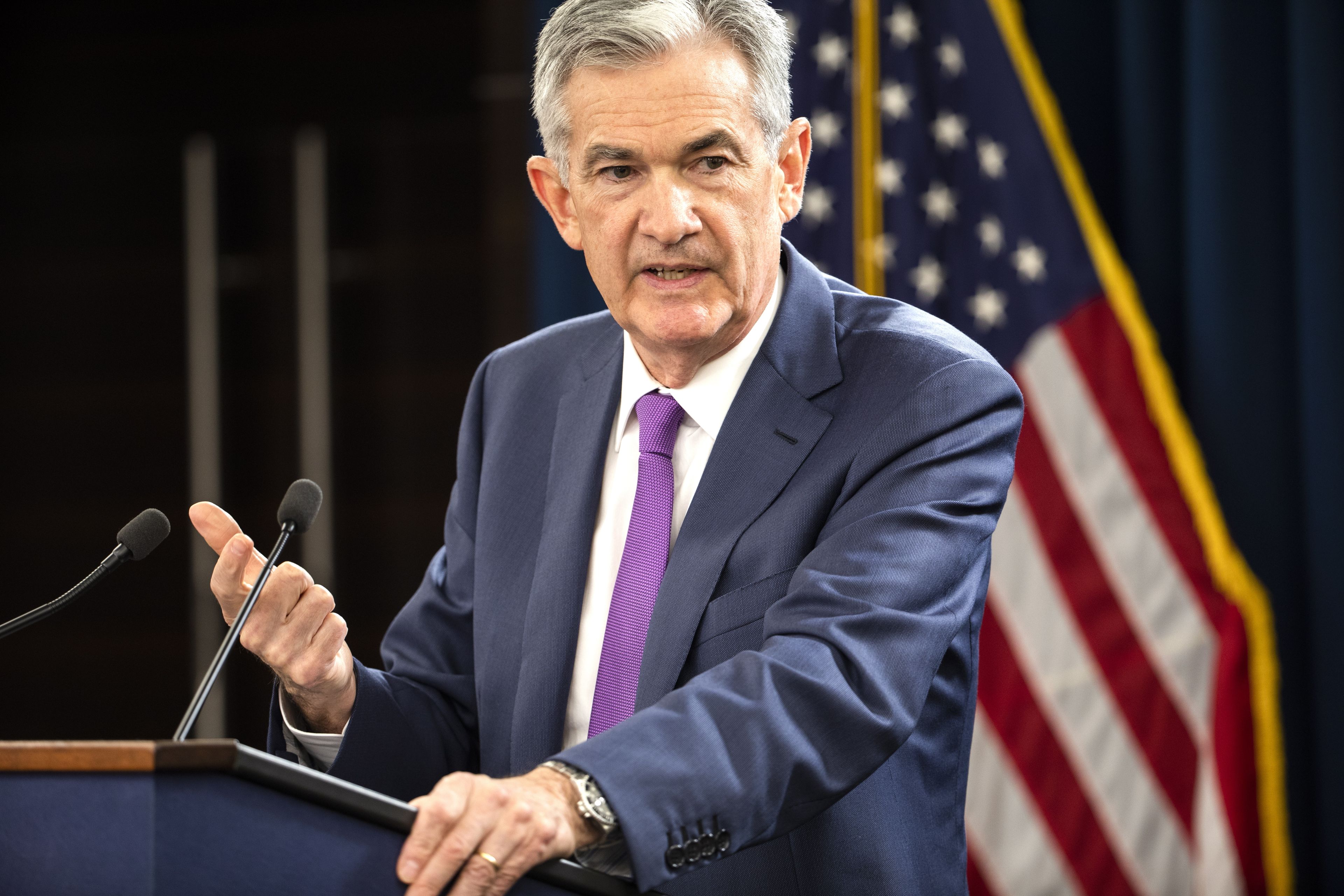 Federal Reserve Board Chairman Jerome Powell announces the Fed is raising interest rates