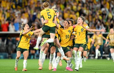 Cortnee Vine of Australia celebrates victory with her team mates after she scores her team's tenth penalty in the penalty shoot out during the FIFA Women's World Cup Australia & New Zealand 2023 Quarter Final match between Australia and France at Brisbane Stadium on August 12, 2023 in Brisbane, Australia. 