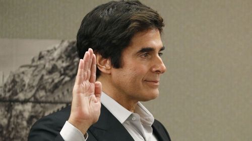 Magician David Copperfield said he didn't know until he was sued that a British tourist claimed to have been seriously injured while taking part in one of his illusions