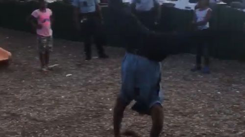 Police officer Arthur Brown Jr starts off with a cartwheel. (Facebook)