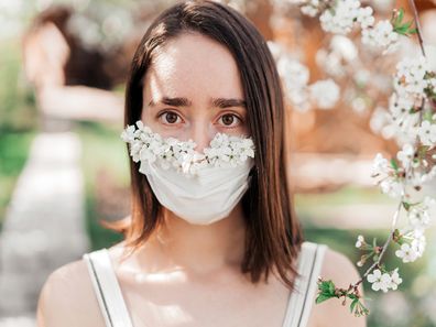 Bridesmaid wearing a face mask.