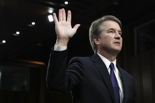 President Donald Trump's Supreme Court nominee Brett Kavanaugh is sworn in before the Senate Judiciary Committee on Capitol Hill in Washington