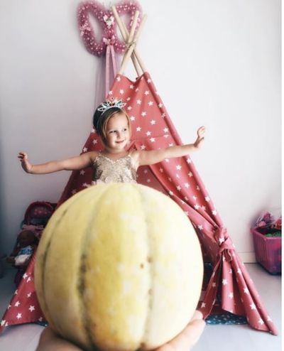 <p>Ready for the ball complete with melon gown.</p>