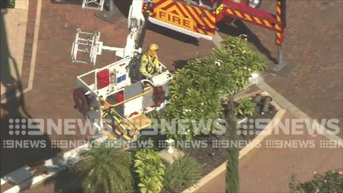 A rescue operation was launched to save the man using a sky lift before he was taken to hospital. Picture: 9NEWS.