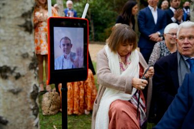 Matty watching the vows at James and Kathryn's wedding.