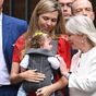 Carrie Johnson steps outside No.10 with baby in a carrier to watch Boris