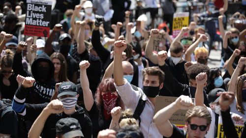 Anti-racism protesters attend a Black Lives Matter demonstration on June 13, 2020 in London, England.