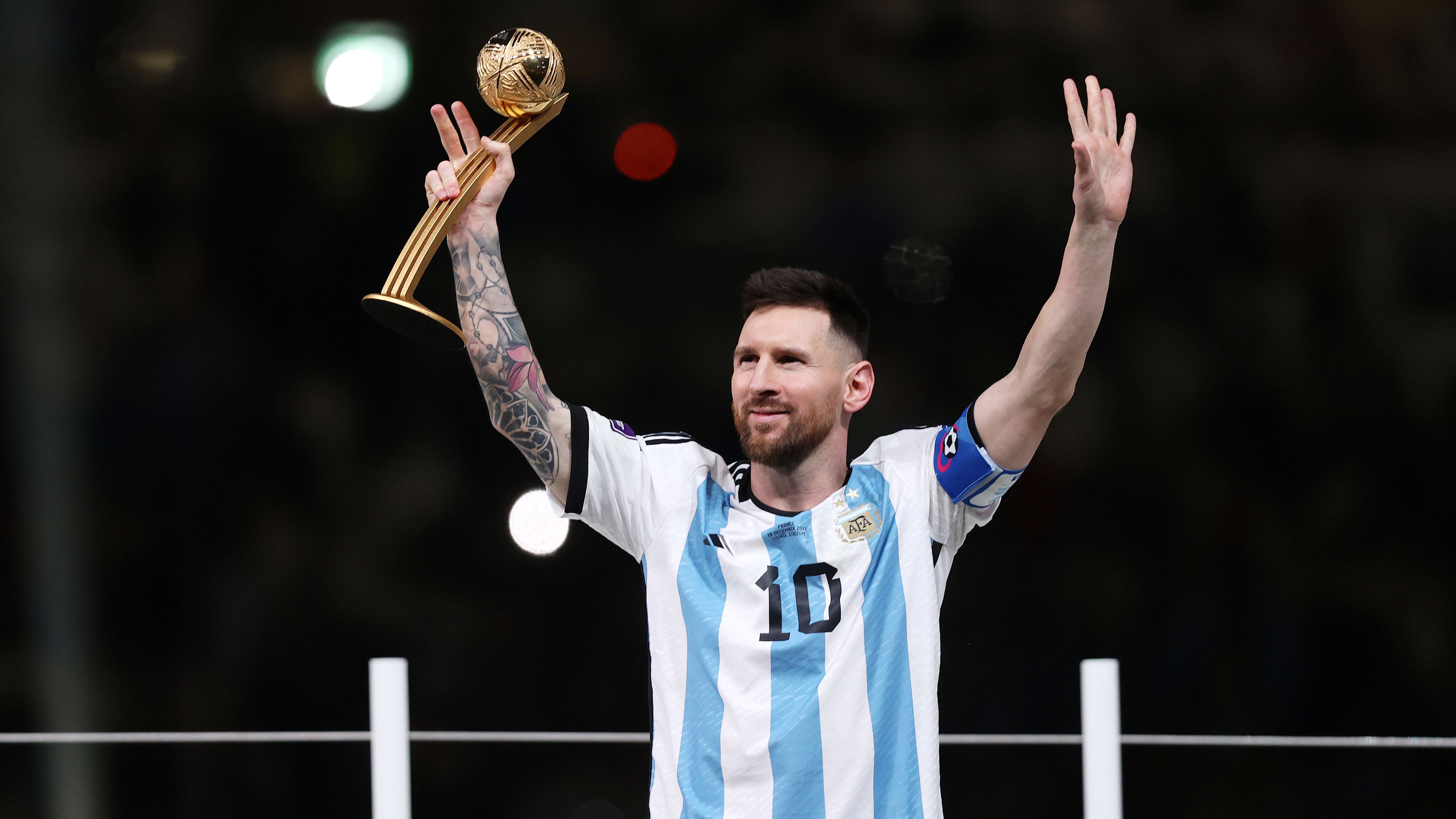 Lionel Messi of Argentina poses for a photo with the adidas Golden Ball after the team&#x27;s victory during the FIFA World Cup Qatar 2022 Final match between Argentina and France at Lusail Stadium on December 18, 2022 in Lusail City, Qatar. (Photo by Julian Finney/Getty Images)