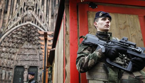 French soldier of France's anti-terror 'Vigipirate' plan, dubbed 'Operation Sentinelle' patrols next to Notre-Dame cathedral of Strasbourg