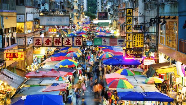 Colourful umbrellas line the streets at Hong Kong's wet markets