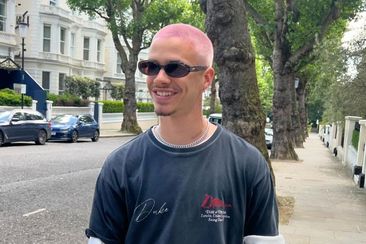 Romeo Beckham debuts a new pink buzz cut