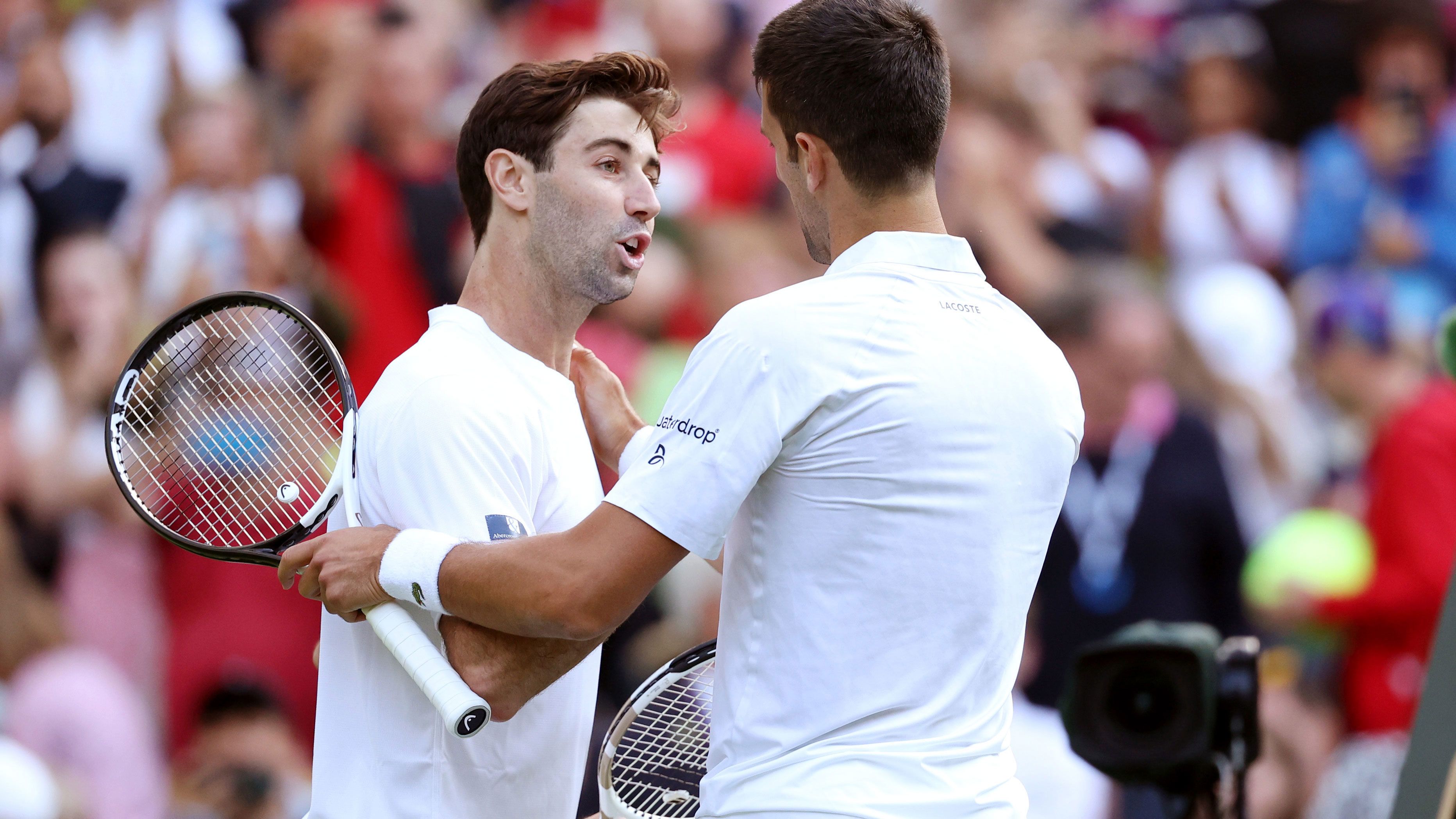 Novak Djokovic shakes hands with Jordan Thompson following their men&#x27;s singles second round match on day three of The Championships Wimbledon. 