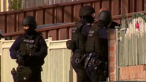 A siege is underway in south-west Sydney with an armed man holed up in a house in Carramar.