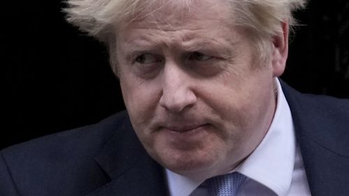 British Prime Minister Boris Johnson leaves 10 Downing Street to attend the weekly Prime Minister's Questions at the Houses of Parliament, in London, Wednesday, February 9, 2022.