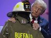 Trump takes the stage alongside uniform of fallen firefighter