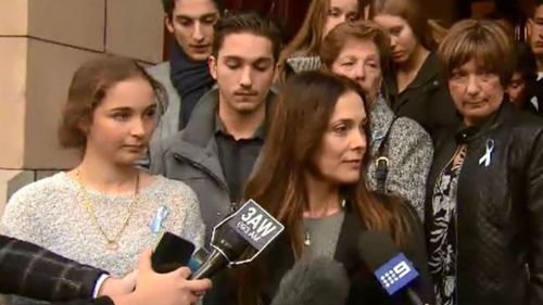 The victim's wife (right) said the sentence would allow them to 'breathe easier' but said 'it's not over.' (9NEWS)