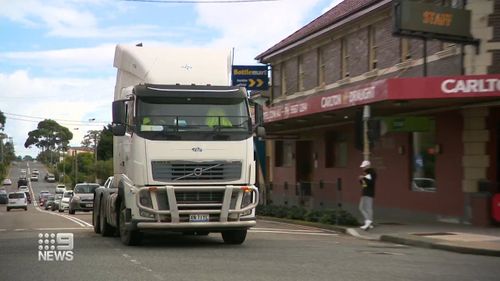 An inquiry has heard a plea for toll charges to be slashed overnight in a bid to keep trucks off Sydney's suburban streets.