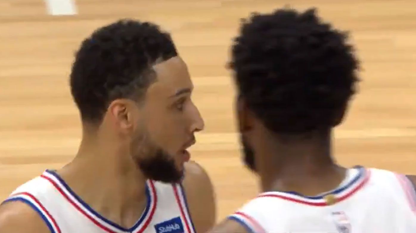 Ben Simmons and Joel Embiid share words late in Game 7.