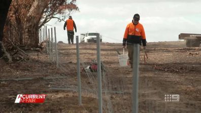 Volunteers rebuild bushfire-ravaged towns one fence post at a time