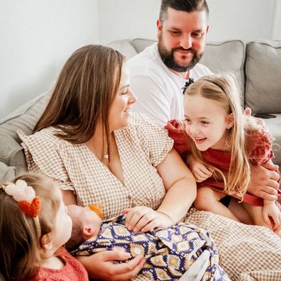 Rebecca Marshall with her husband, two daughters and baby son.