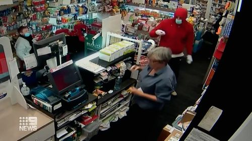 A knife-wielding robber has threatened employees at a pharmacy in Sydney's south-east this morning.