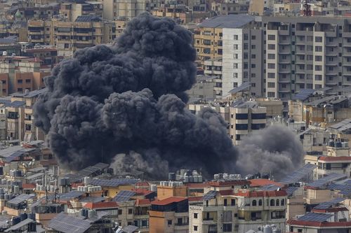 Smoke rises following an Israeli airstrike on Dahiyeh, in the southern suburb of Beirut, Lebanon, Friday, March 28, 2025